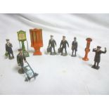 A selection of Hills O-gauge painted metal railway figures including luggage porter with trolley,