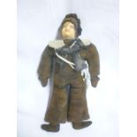 An old wax headed musical sailor doll with cloth body 14" long