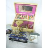 A jewellery box containing a quantity of various costume jewellery