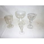 Three various 19th Century stemmed drinking glasses and one other large glass goblet shaped bowl