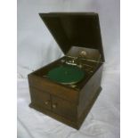 An old oak table top gramophone by HMV