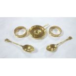 A pair of 9ct gold circular napkin rings,