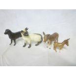 Four Beswick china figures including donkey, donkey foal,