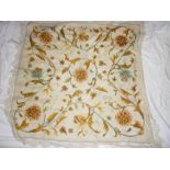 A Victorian needlework rectangular table cloth with floral decoration