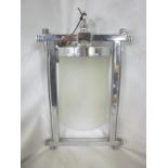 An Art Deco chromium plated hall lamp with opaque glass shade