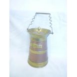 An old brass mounted copper tapered milk/water carrier by The Owl Works Oldham,