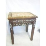 A Chinese mahogany rectangular plant table with inset pink marble rectangular top and inlaid mother