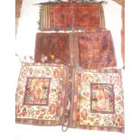 Two Eastern hand knotted saddle bags with geometric decoration and a small Eastern rectangular wool