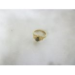 A 9ct gold dress ring set black oval stone