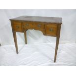 A 19th Century mahogany rectangular side table with three drawers in the frieze and brass ring