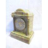 A good quality mantel clock with silvered and gilt circular dial in brass-mounted green onyx