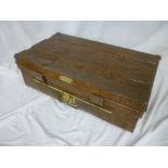 An unusual 19th Century japanned metal rectangular trunk with crocodile skin-effect decoration by