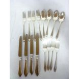 Four silver table forks with tapered stems, four matching dessert forks,