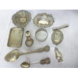 A Victorian silver "Kings" pattern serving spoon, small silver oval photo frame, sweetmeat dish,