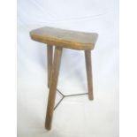 A 19th Century elm rustic three legged stool