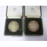 Two silver presentation medallions for the City & Guilds of London Institute,
