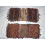 Two Eastern hand knotted saddle bags with geometric decoration