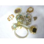 A quantity of various of costume jewellery including bangle, brooches,