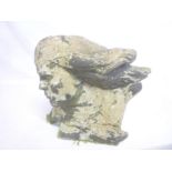 A weathered composition classical female bust figure,