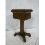 A Victorian figured mahogany square teapoy with fitted compartments enclosed by square and
