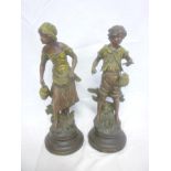 A pair of Continental spelter figures of a male & female "A la Fontaine/Bonne Peche" after L&F