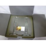 A pair of Waterford crystal candlesticks in fitted box