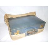 A high quality brass mounted blue Morocco leather travelling case with fitted interior and a fabric