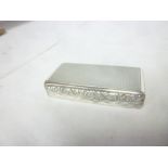 A George IV silver rectangular pocket box with floral decorated hinged lid, Birmingham marks,