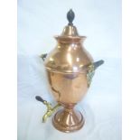 An old brass mounted copper pedestal samovar with tapered mounts and base tap