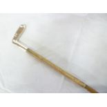 A Continental silver topped riding crop,