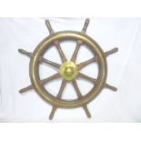 An old brass mounted mahogany ships wheel,