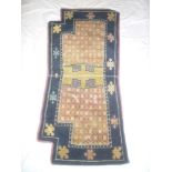 An Eastern hand knotted rectangular wool saddle cloth with geometric decoration on blue & cream