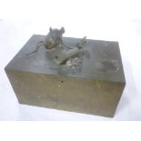 An unusual old brass rectangular table box, the hinged lid decorated with three mice and a scroll,
