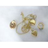 Two various 9ct gold heart-shaped pendants with chain necklaces,