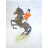 A Beswick china figure of a huntsman on horseback No.