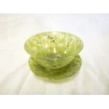 A Chinese jade circular tea bowl and stand 4" diameter