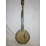An old rosewood banjo with mother of pearl inlay