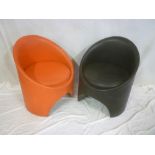 A pair of 1960's/70's vinyl tub easy chairs in orange/black vinyl by Evans Furniture Limited