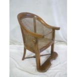 A Victorian walnut child's chair with cane work seat and back on square shaped legs