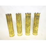 Two pairs of First War trench art brass shell cases/vases with raised decoration