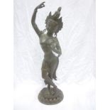 A 19th Century Eastern bronze figure of a standing deity 21" high