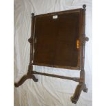 A 19th Century mahogany square toilet mirror with bobbin turned supports