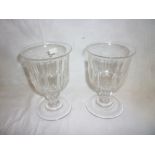 Two late 18th /early 19th Century stemmed rummer glasses on circular bases.