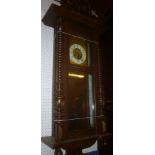 A good quality Vienna-style wall clock with gilt and enamelled arched dial in polished mahogany