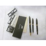 Three various Mont Blanc pens with accessories