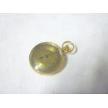 A ladies 18ct gold fob watch with circular decorated dial in engraved case