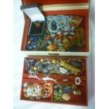 A jewellery box containing a quantity of various costume jewellery