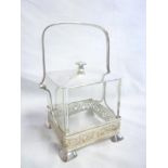 A good quality glass and silver plated square biscuit jar and cover with swing handle