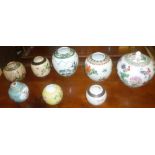 A selection of various Chinese gift jars,