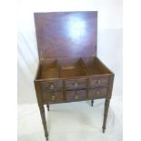 A 19th Century mahogany rectangular dressing stand with part fitted interior enclosed by a hinged